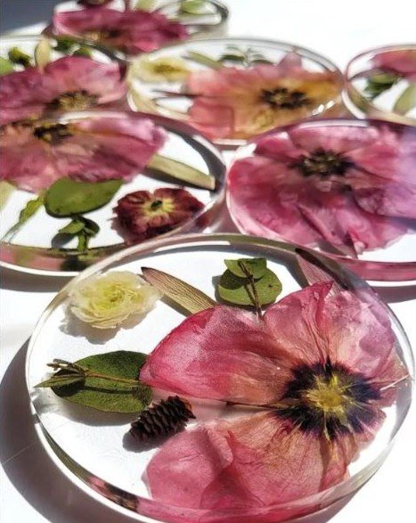 Coasters made from Natalie's bouquet, pink petals in clear resin
